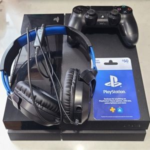 Sony PlayStation 4 with headphones, controller and $50 gift card.